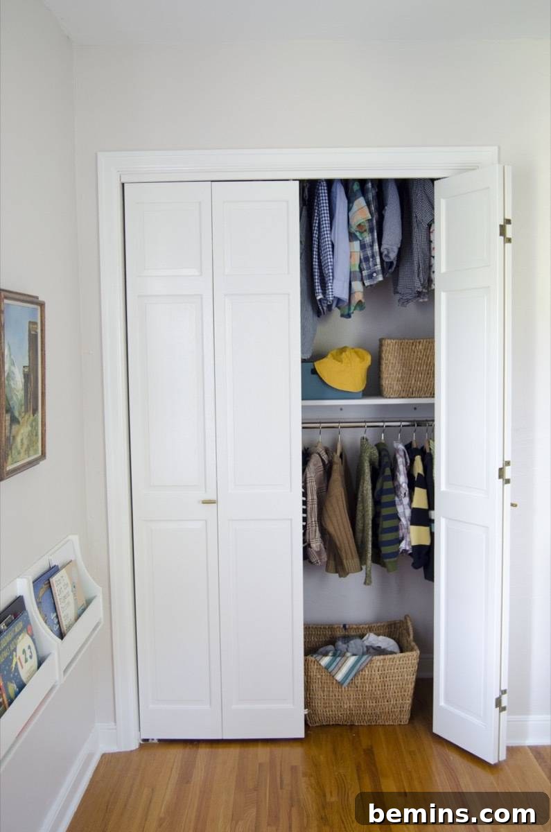 Open closet with organized clothes and accessories for a small boy, showcasing the Modular Closets system.