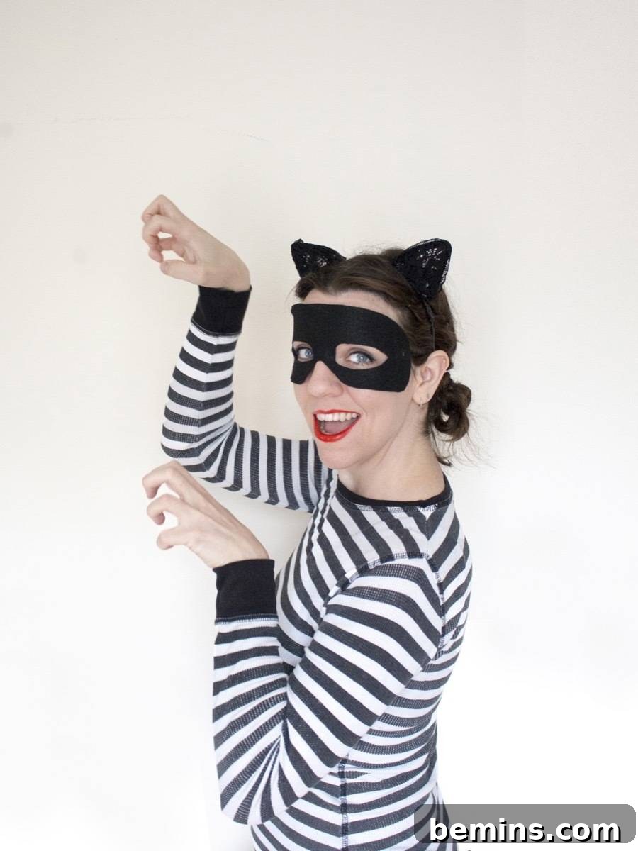 Whip Up 5 Quick Costumes With Just Cat Ears 7 DIY Cat Burglar Costume Idea - Striped Shirt, Mask, and Cat Ears