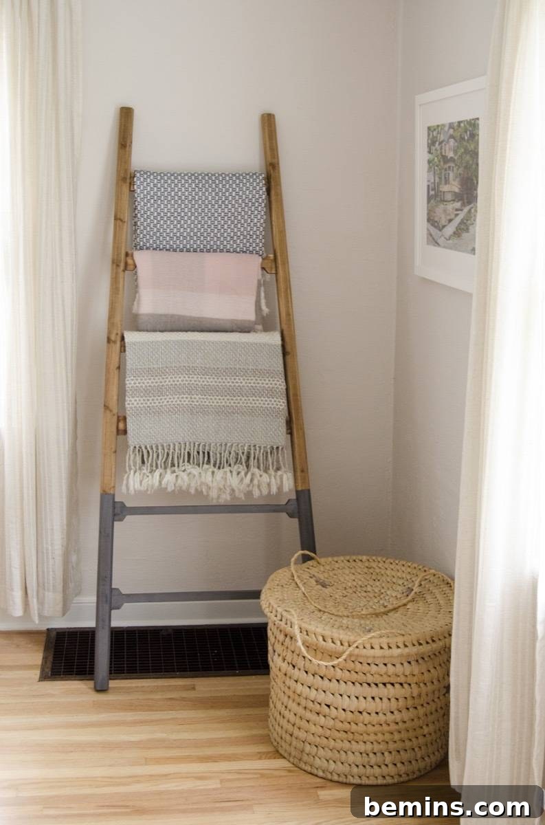 Blanket Ladder with Mid Century Modern Chair and Basket
