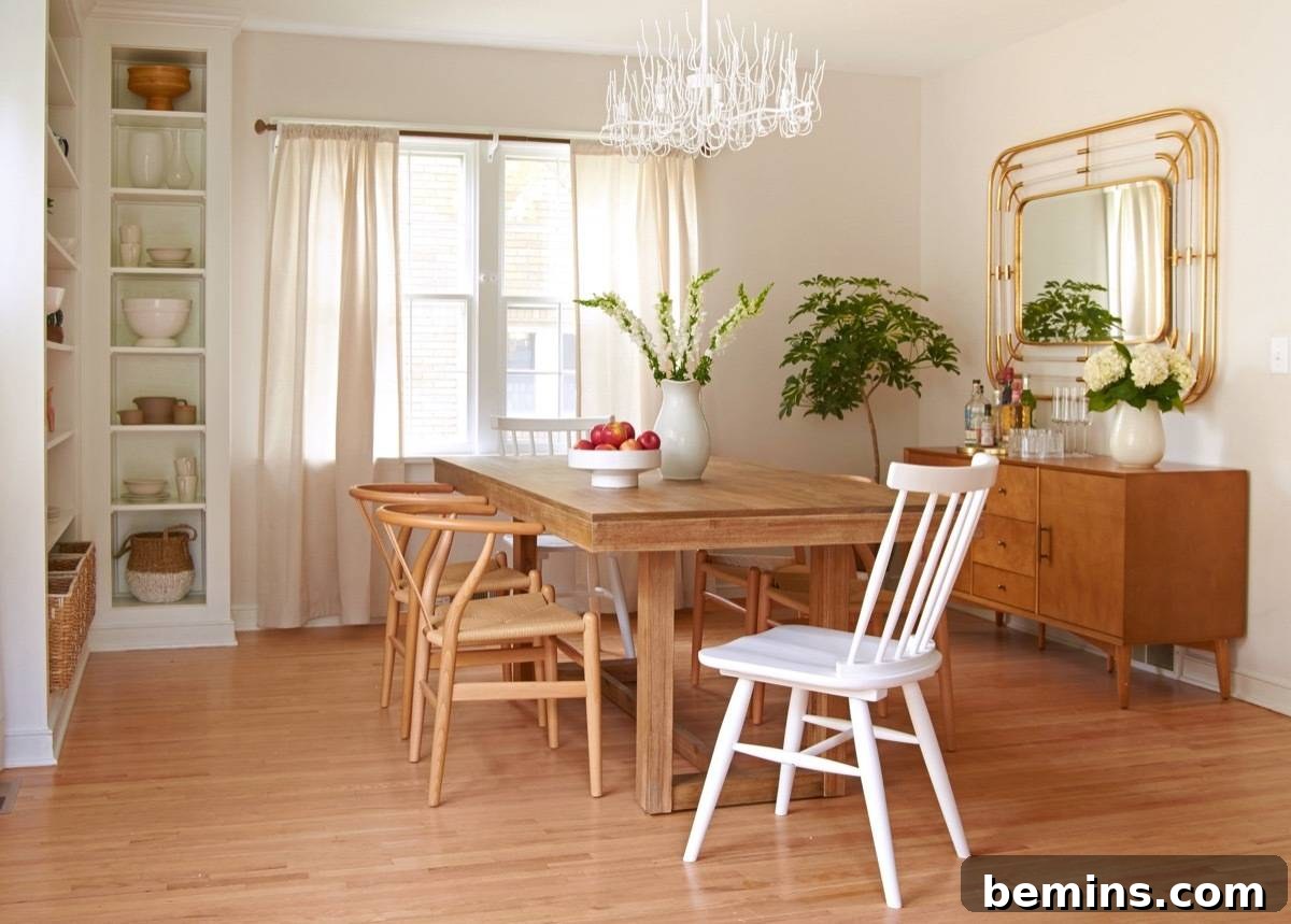 Curbly House Dining Room Makeover - Art Deco Mirror, Buffet, Wishbone Chairs