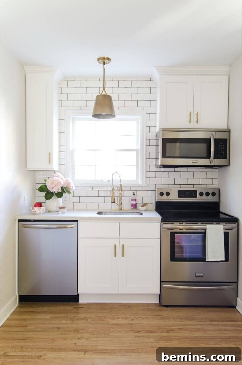 Kitchen, After - Stainless Steel Appliances, Gold Accents, Subway Tile with Black Grout
