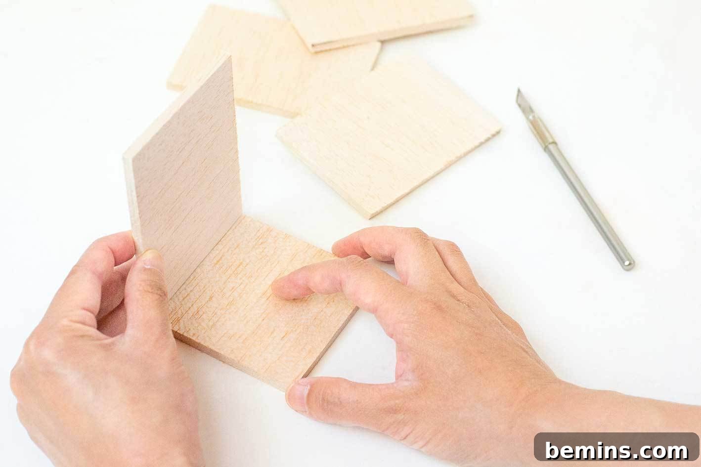 Gluing balsa wood planter side to the base