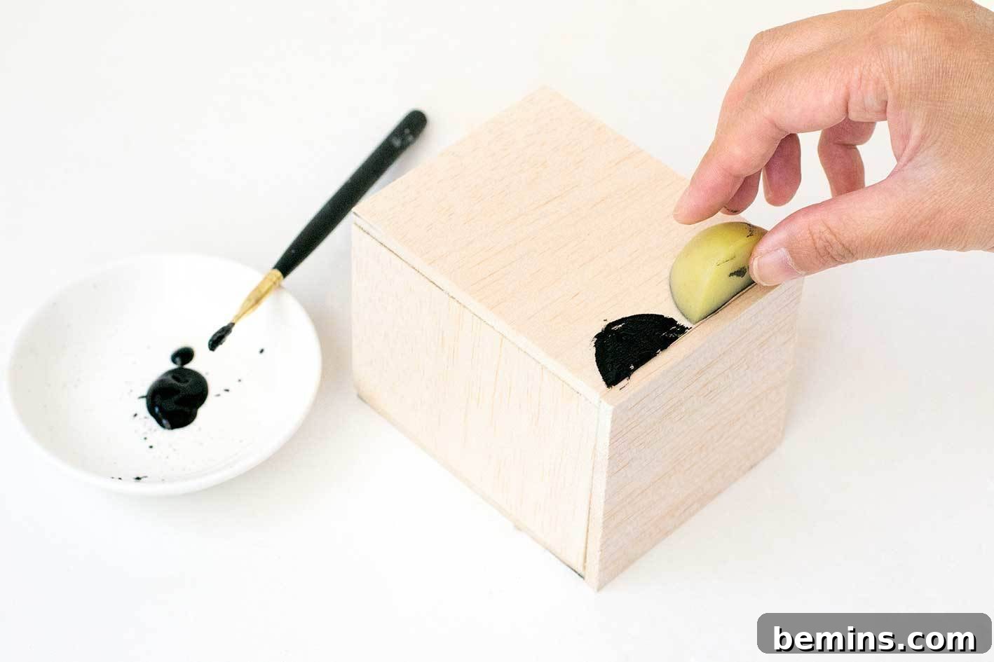 Stamping scalloped design on balsa wood planter