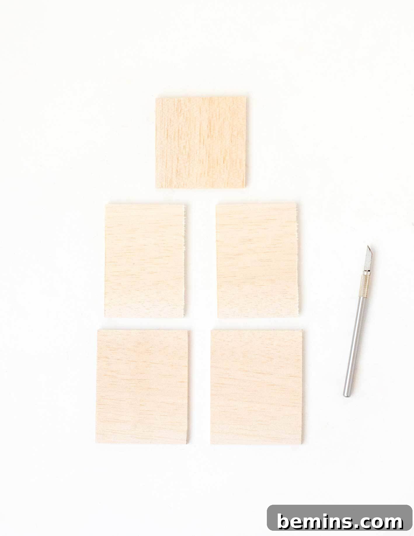 Cutting balsa wood pieces for DIY planters