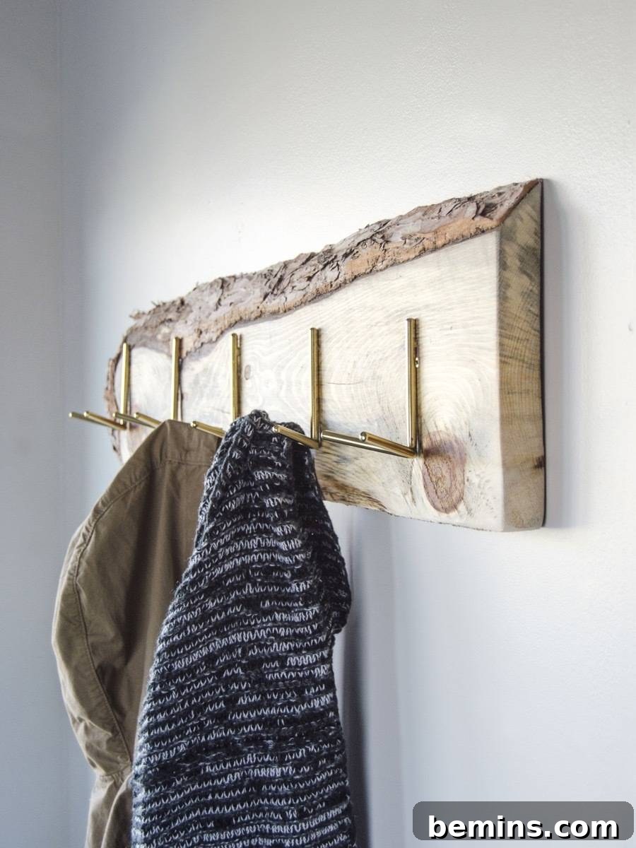 Wall-mounted coat rack made from a wooden board