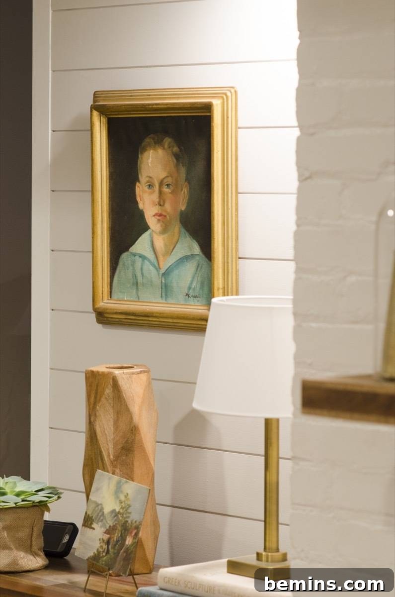 A picture of a boy hanging on a wall.