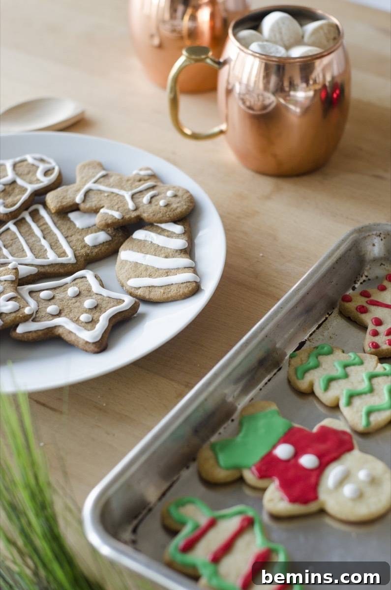 How to Host an Unforgettable Cookie Decorating Bash 12 Cookies sitting on a wooden table.
