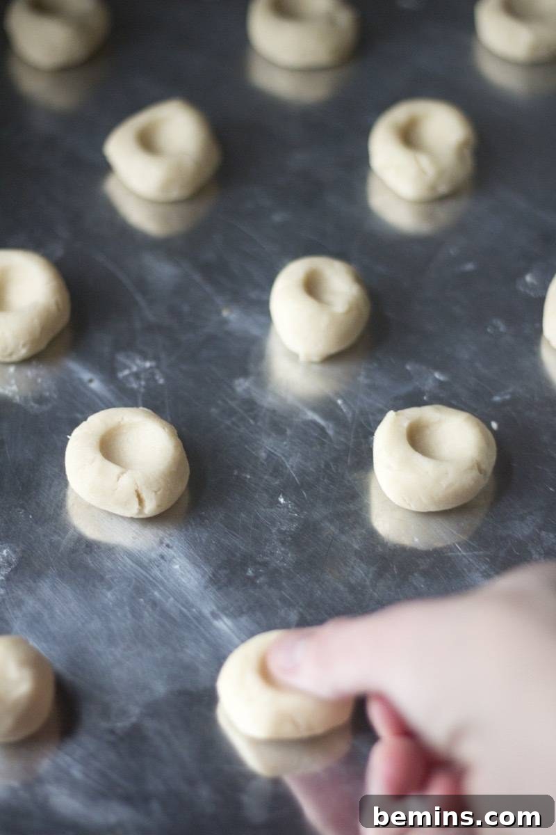 How to Host an Unforgettable Cookie Decorating Bash 4 Holiday Party Idea | Throw a cookie decorating extravaganza | Step 2: Let Guests Know it's BYOCS (Bring-Your-Own-Cookie-Sheet!)