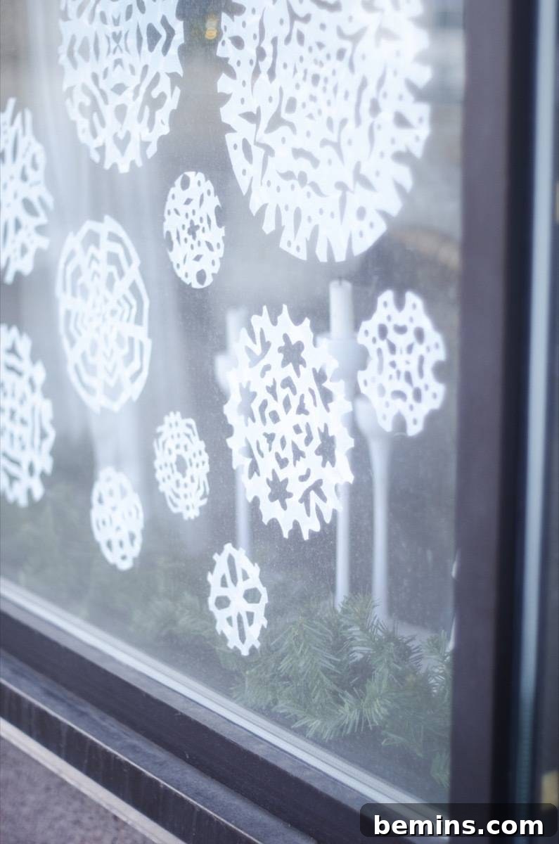 DIY window decals - Snowflakes made from shelf liner