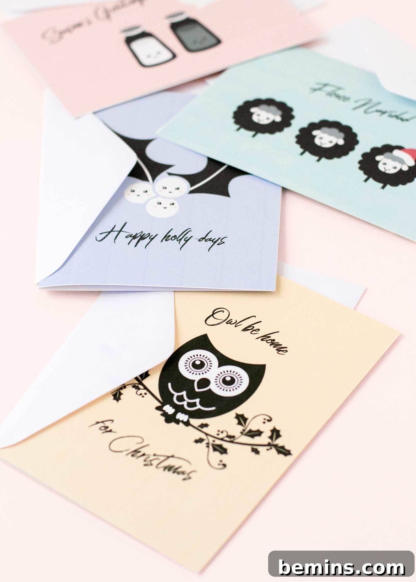 More examples of the punny Christmas card designs.