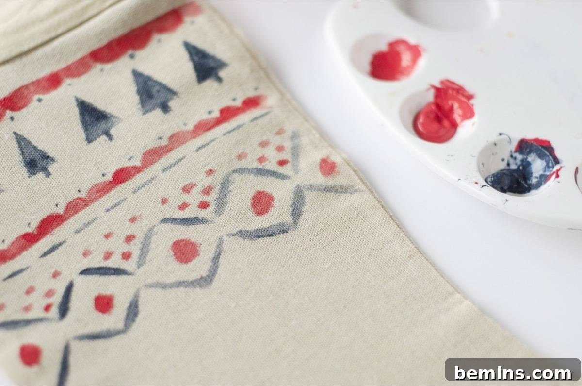 How to create a watercolor effect for Scandinavian-inspired DIY stockings with acrylic paints.