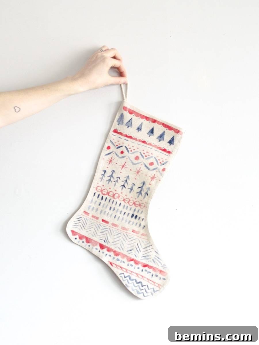 How to hand-paint stockings using a watercolor effect with Nordic designs.