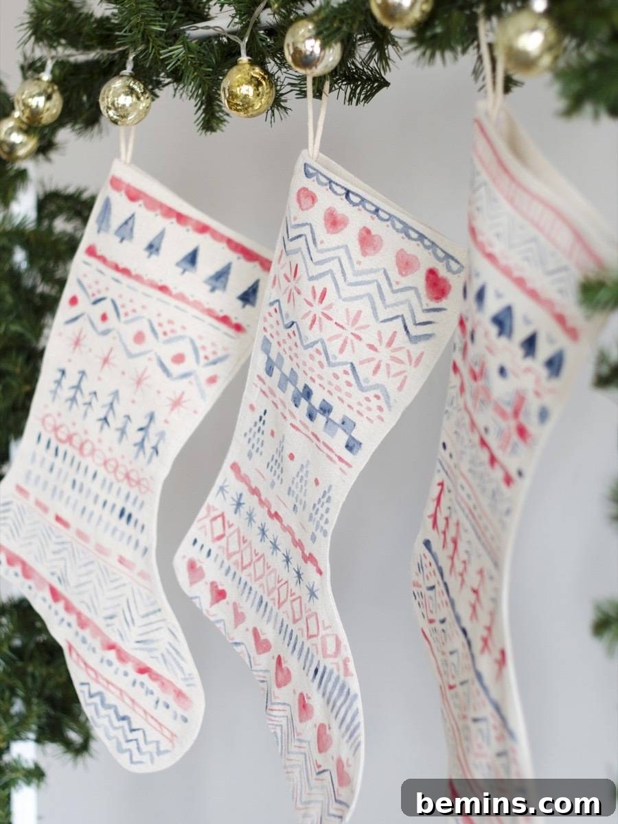 DIY Nordic stockings with hand-painted patterns.