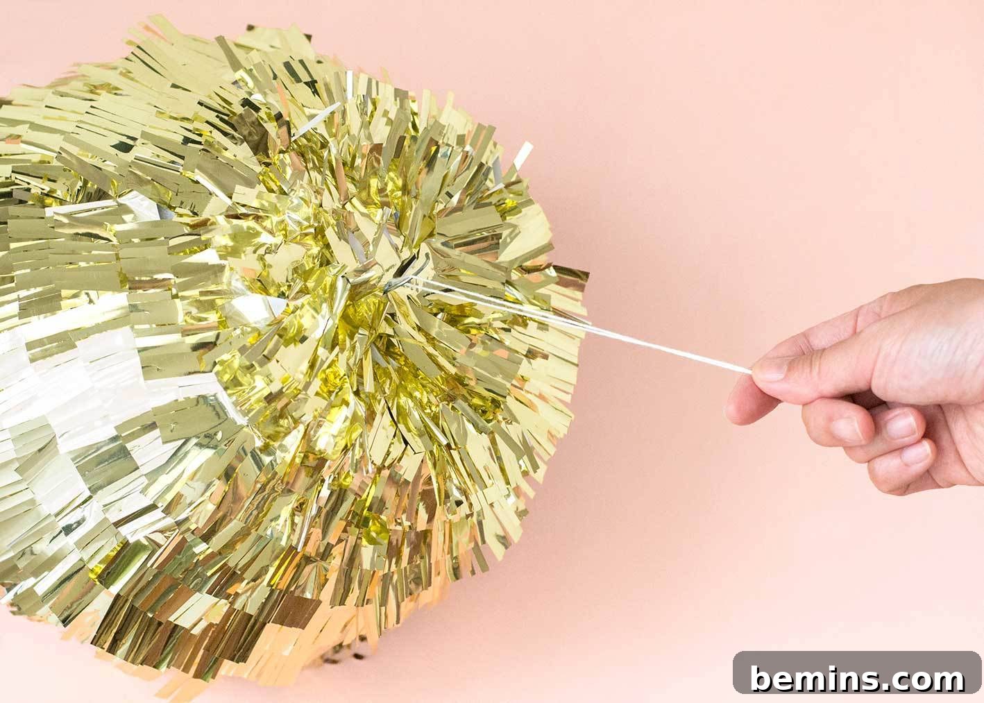 Bauble Piñata Step 8 - Attach Hanging String