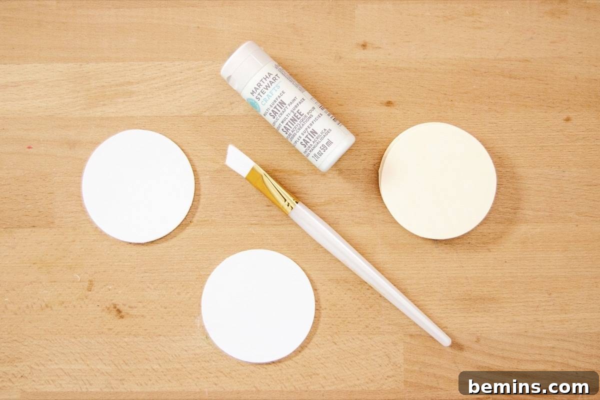 Punny Christmas ornaments - Painting the wood rounds white