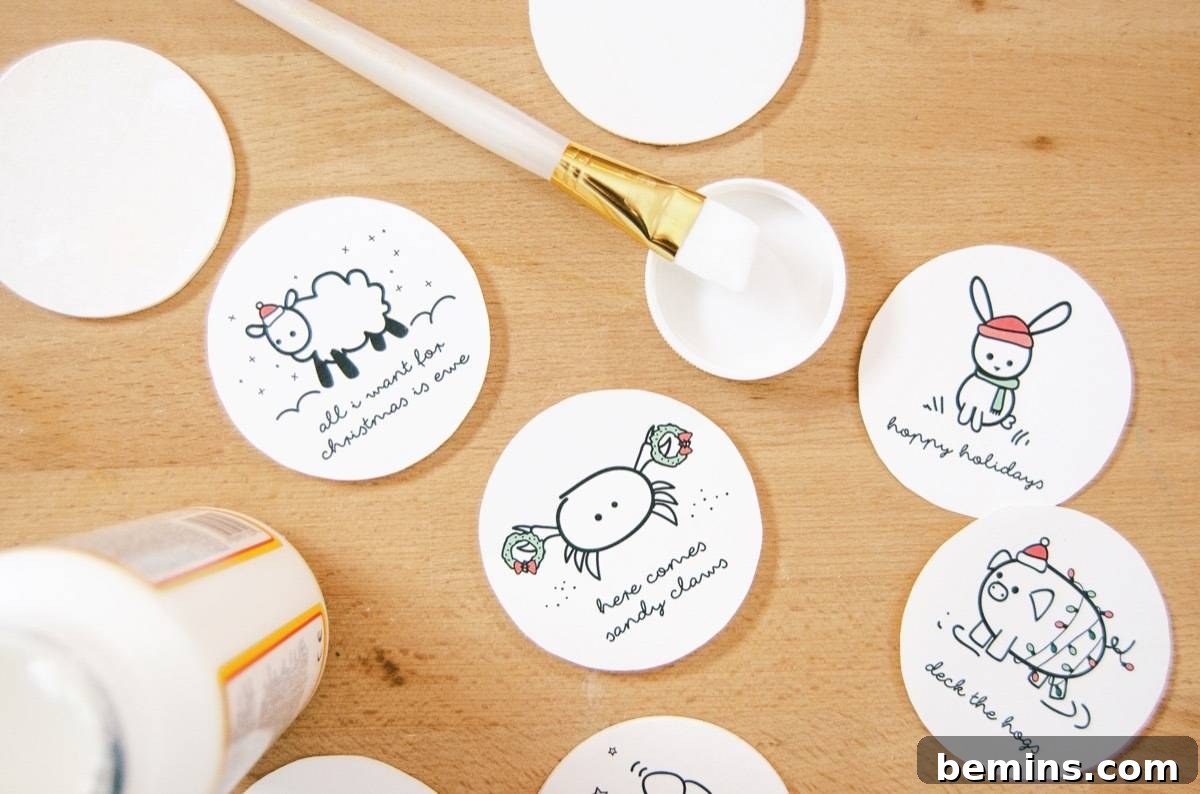 Punny Christmas ornaments - Applying Mod Podge and the printed design