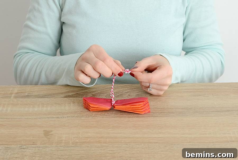 Folding Tissue Paper into Accordion Shape for Pom Pom Ornament