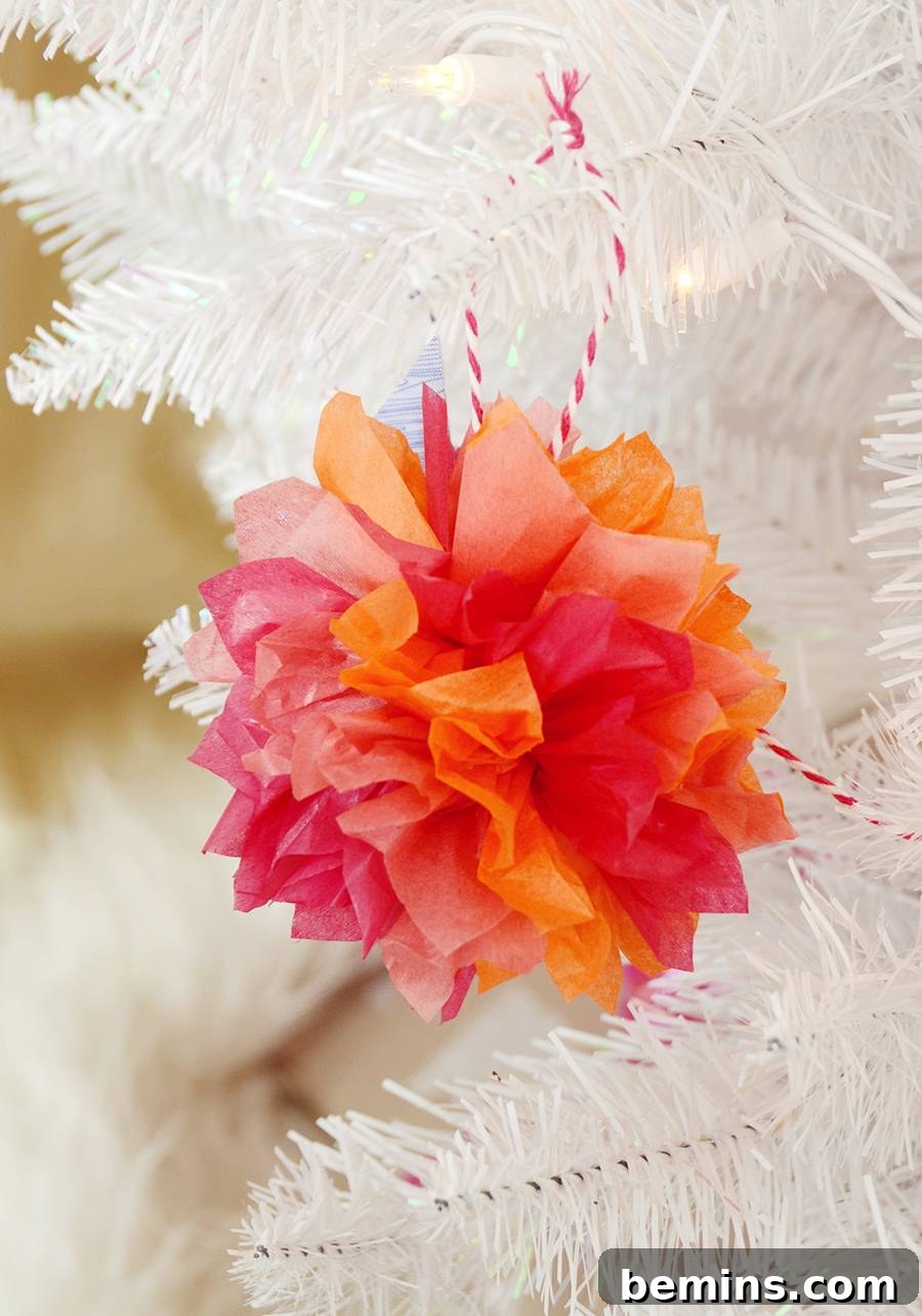 Fluffing the Tissue Paper Pom Pom Ornament