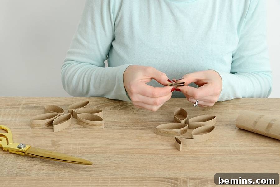 DIY Snowflake Ornament Made from Recycled Cardboard Rolls