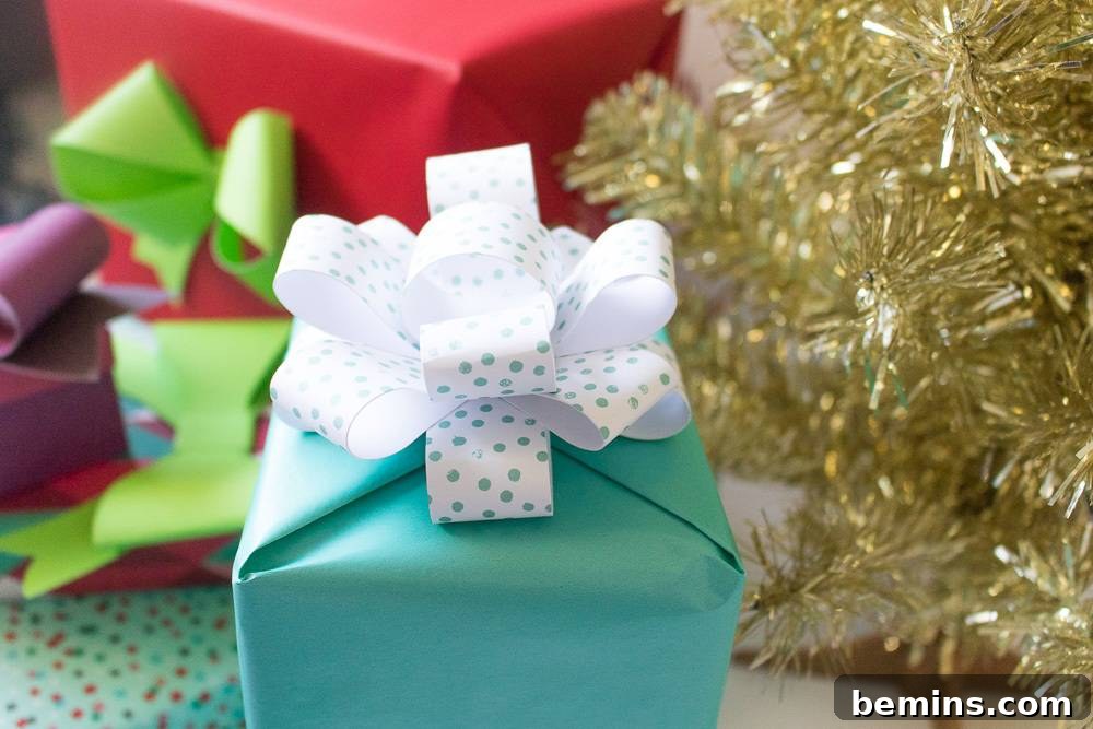 Gift Boxes with Paper Bows Next to Holiday Tree