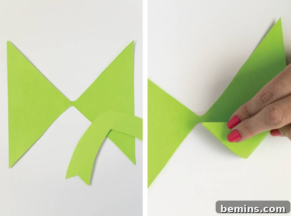 Folding Green Paper to Create Diamond Fold Bow