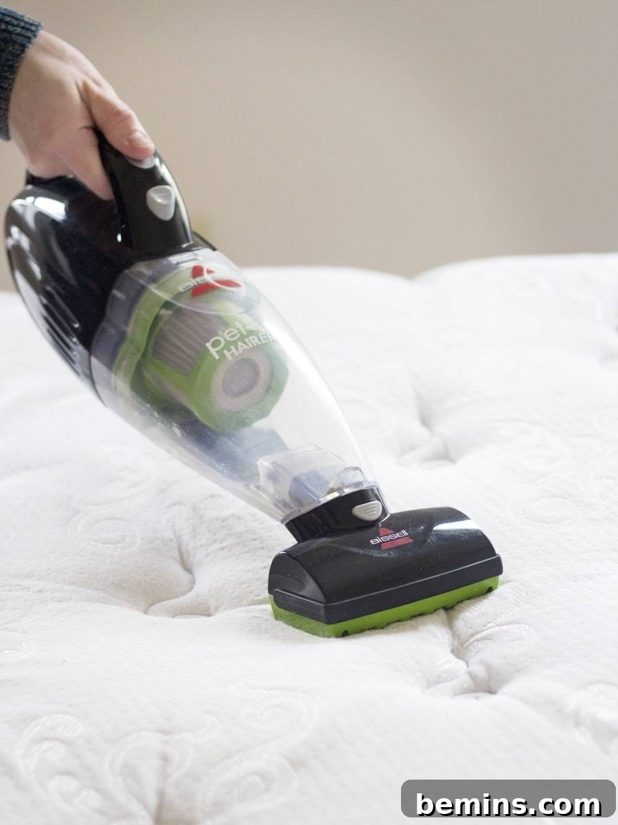 How to Clean your Mattress: Strip and vacuum the mattress