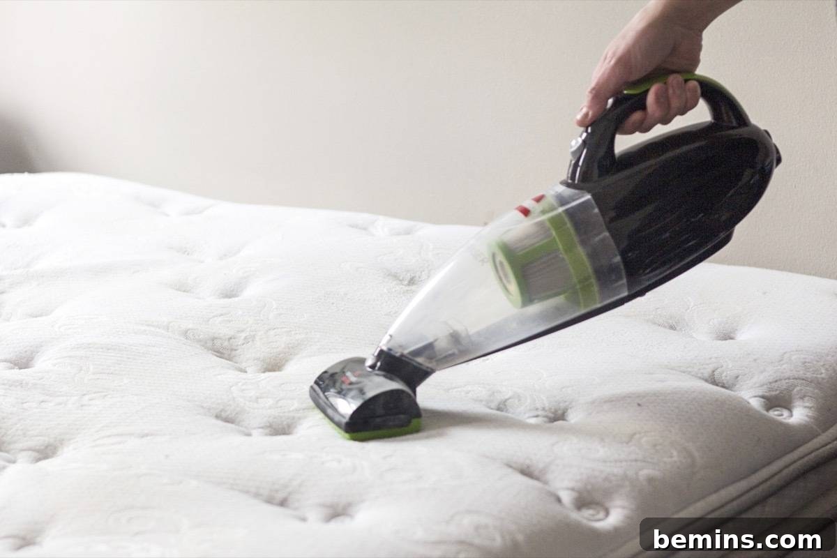 How to Clean your Mattress: Vacuum baking soda to remove moisture