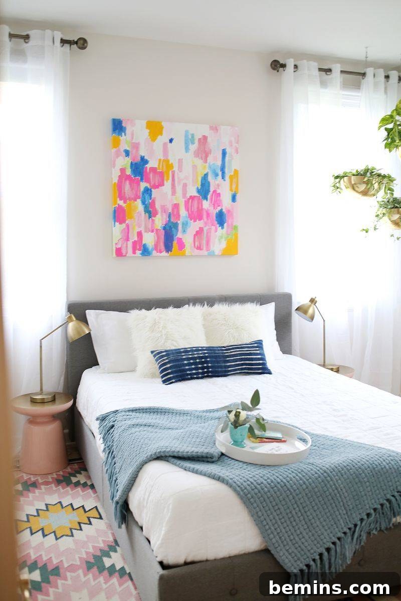 Creating a Haven: Elevate Your Bed to Ultimate Comfort 3 Colorful poster above a bed between two windows, adding a vibrant touch to the bedroom decor.