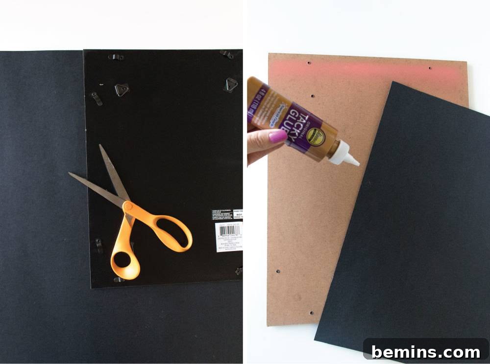 Glue and scissors arranged on top of cardboard during the crafting process.