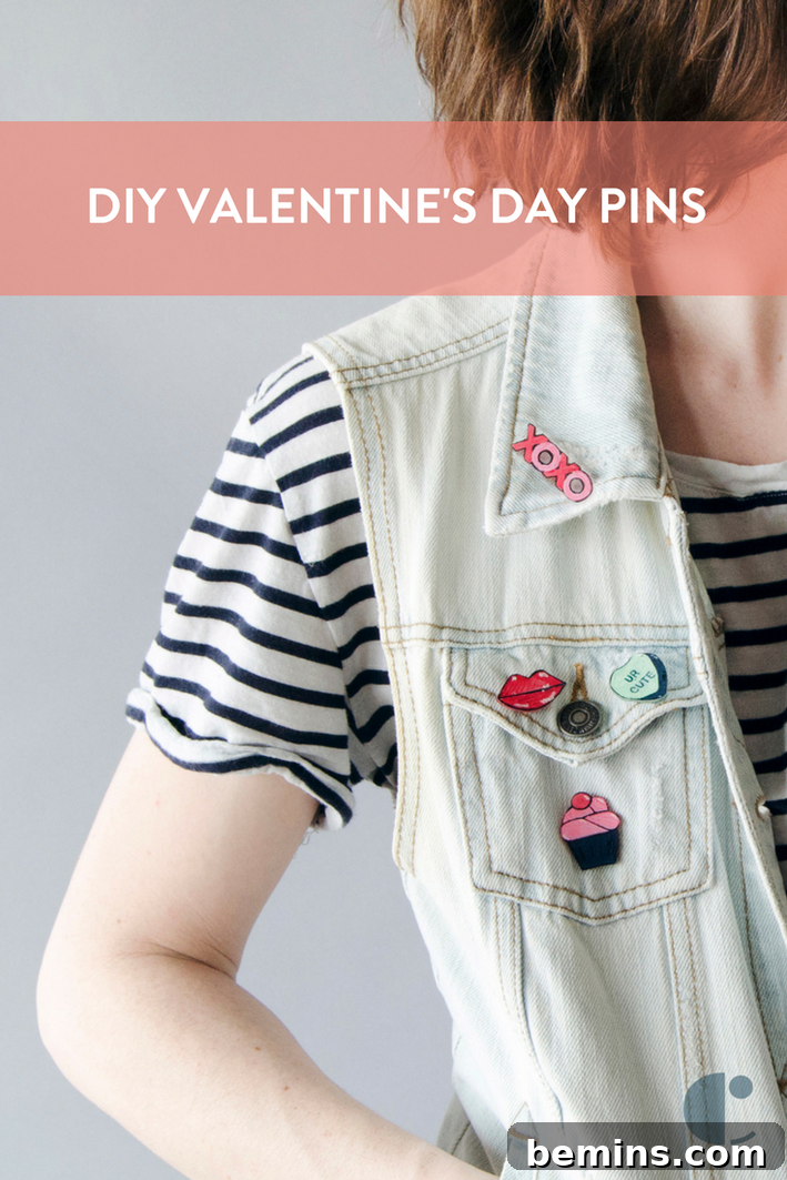 A denim vest with valentines on it.