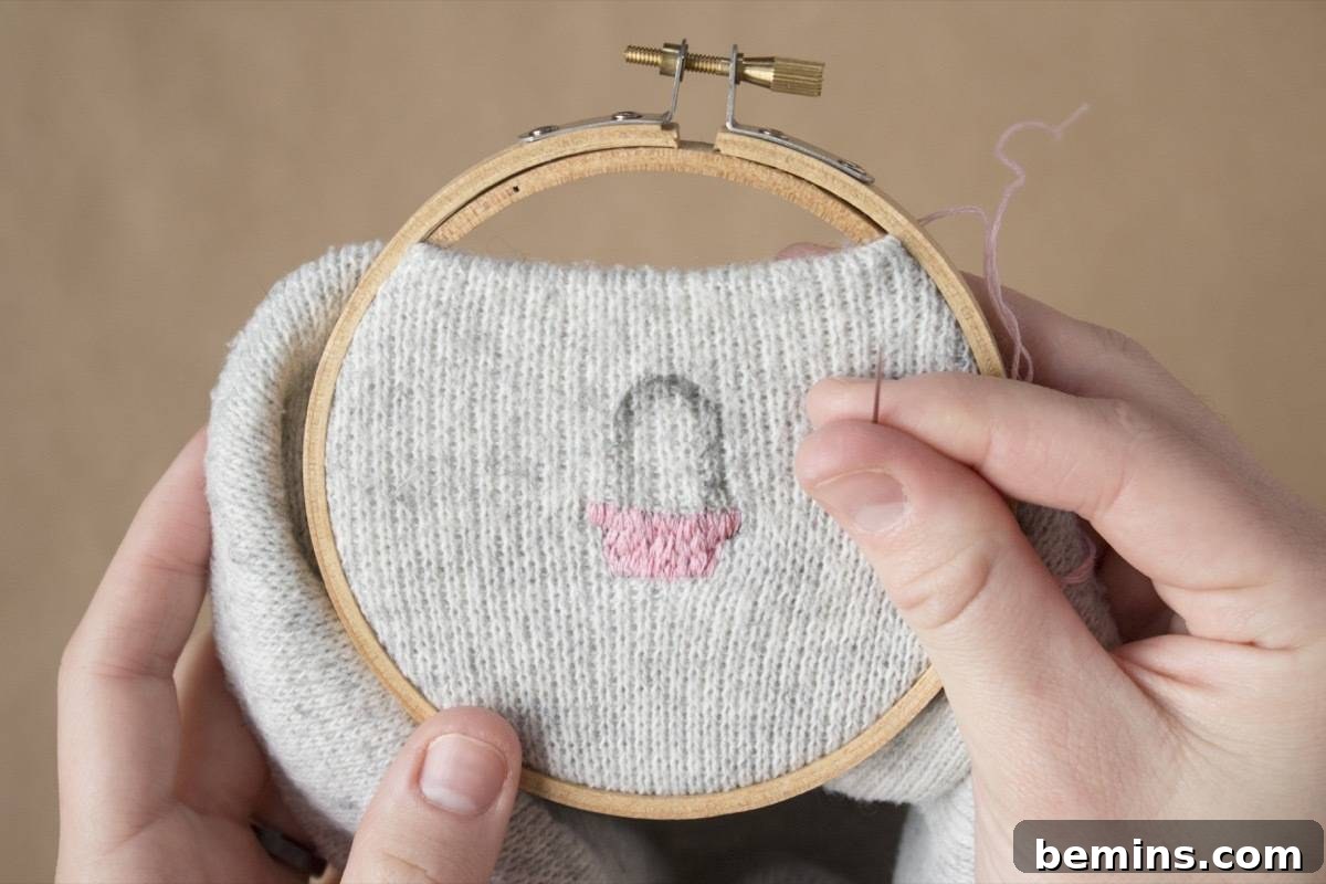 Filling in the design with embroidery floss