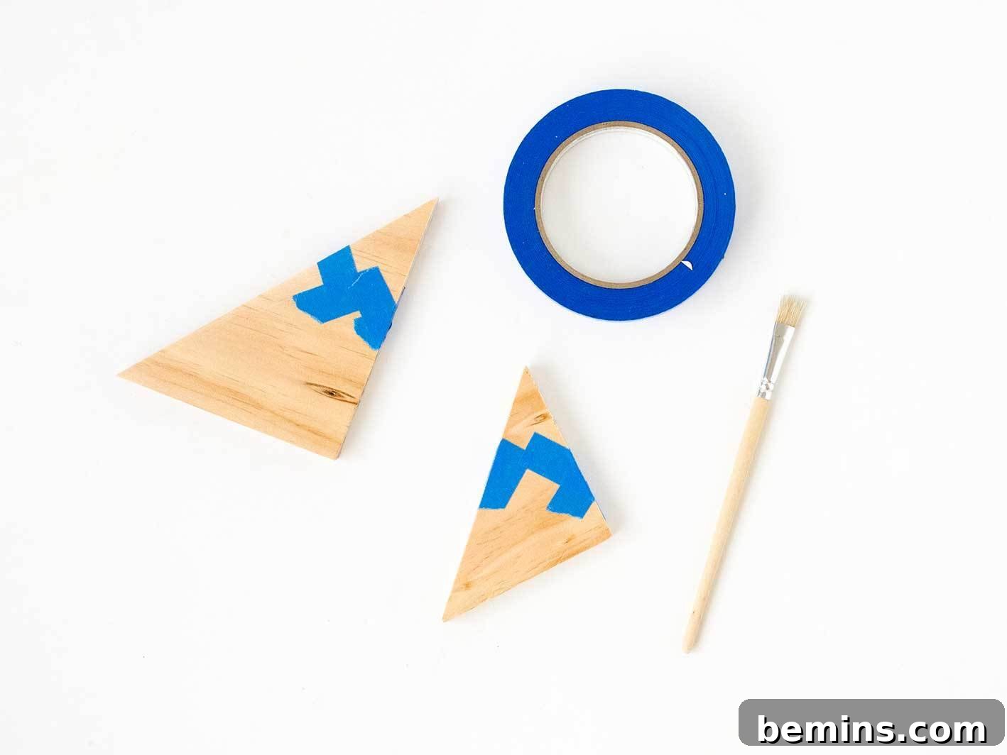 Applying painter's tape to the triangle tips