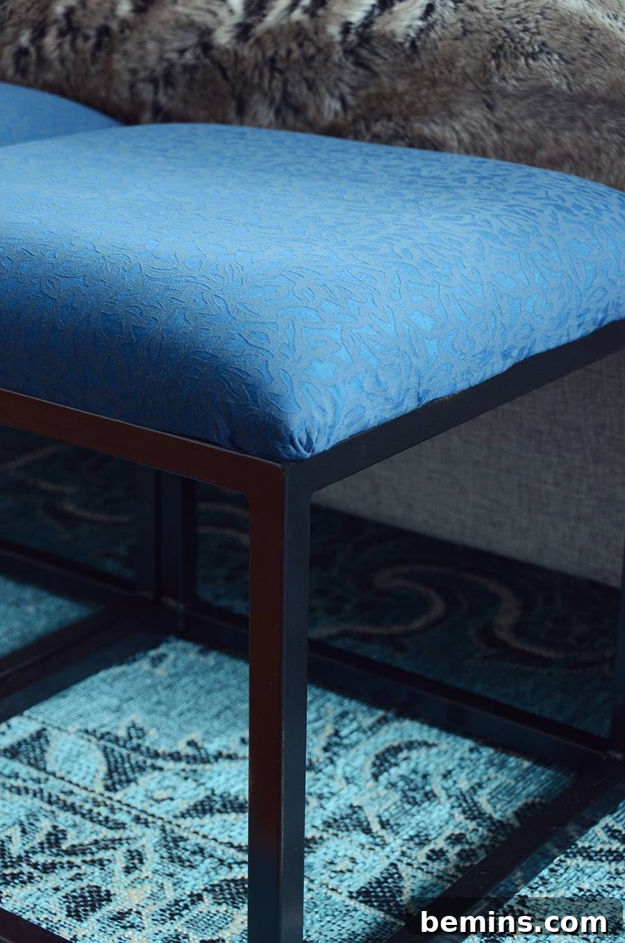 Effortless Ottoman Upgrade: A Simple DIY Transformation 13 Close-up of the Reupholstered Ottoman Fabric