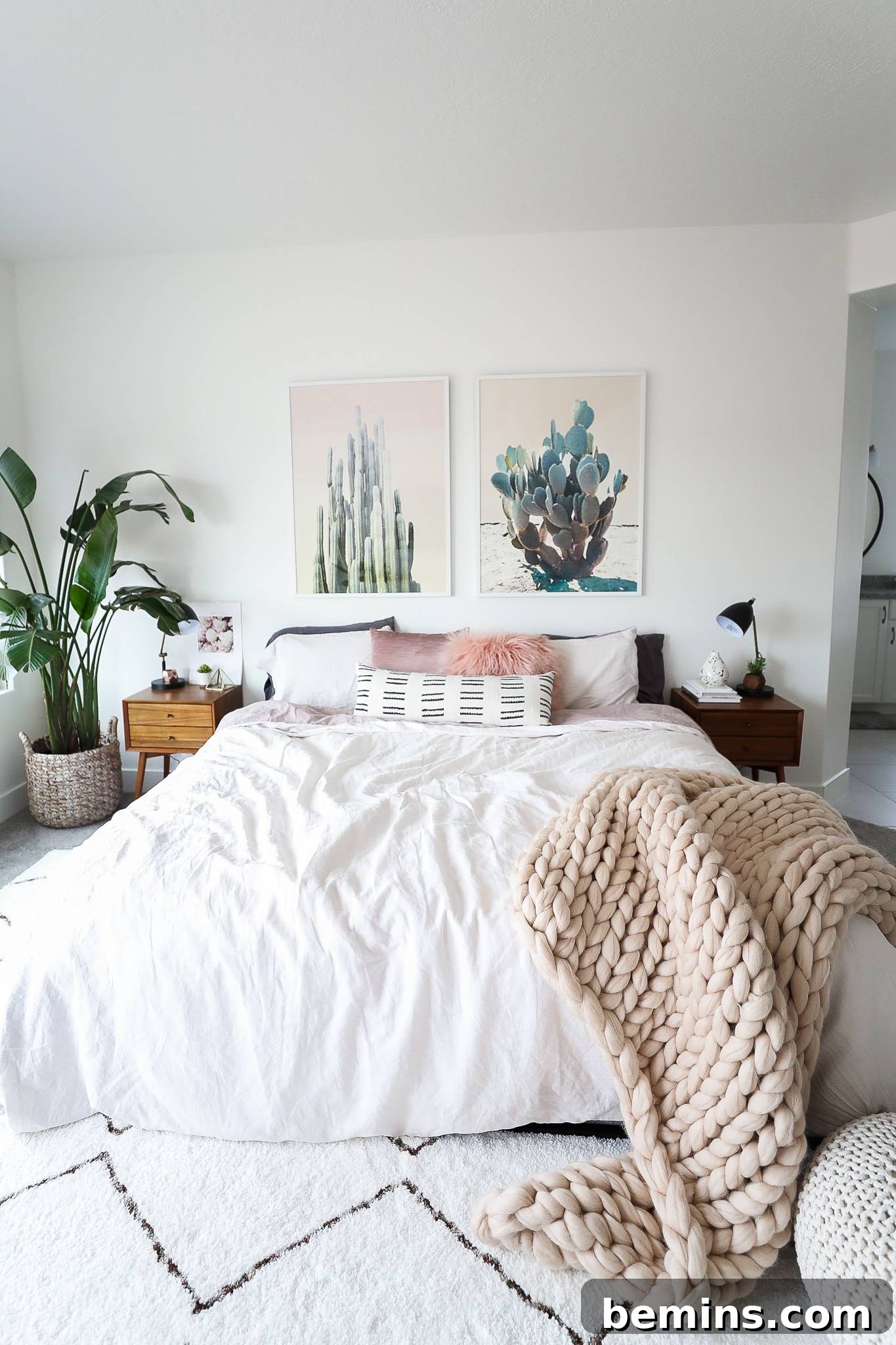 Glamorous boho-chic bedroom with chunky knits and cactus prints.