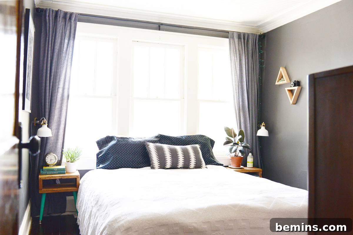 Muted bohemian bedroom with plants and quirky accents.