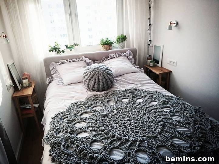 Moody bohemian bedroom with crochet and knit textiles.