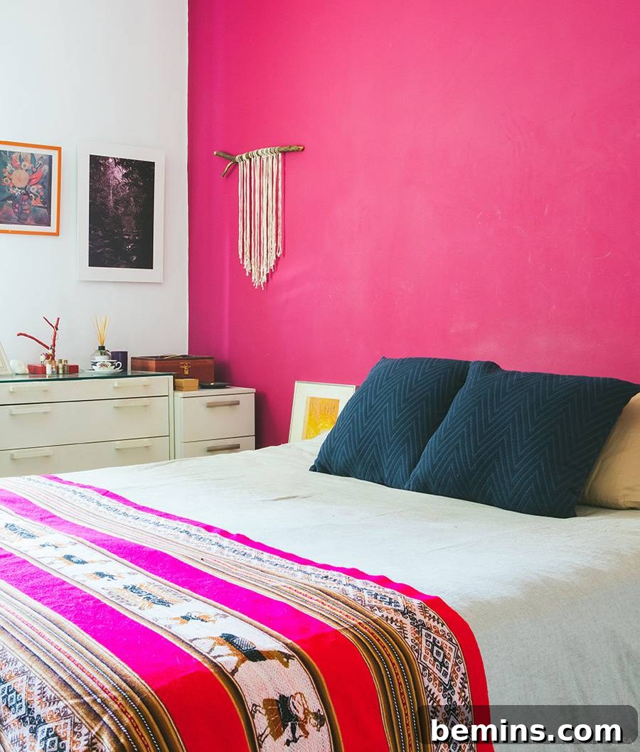 Bohemian bedroom with hot pink accents.