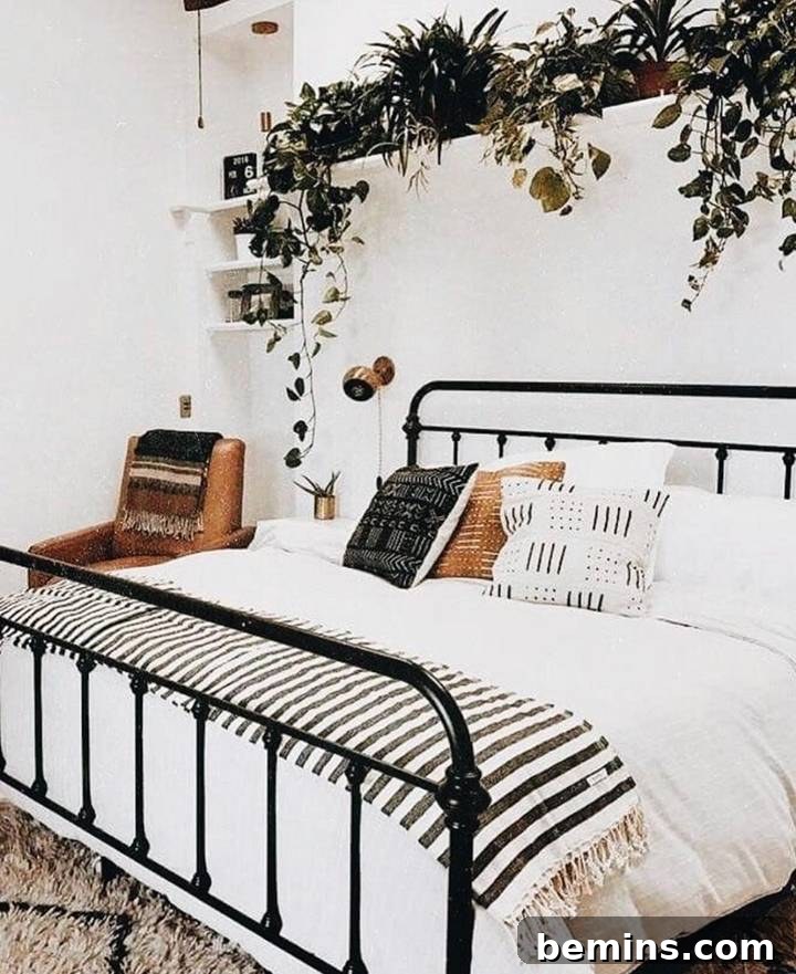 Bohemian bedroom with mudcloth pillows.