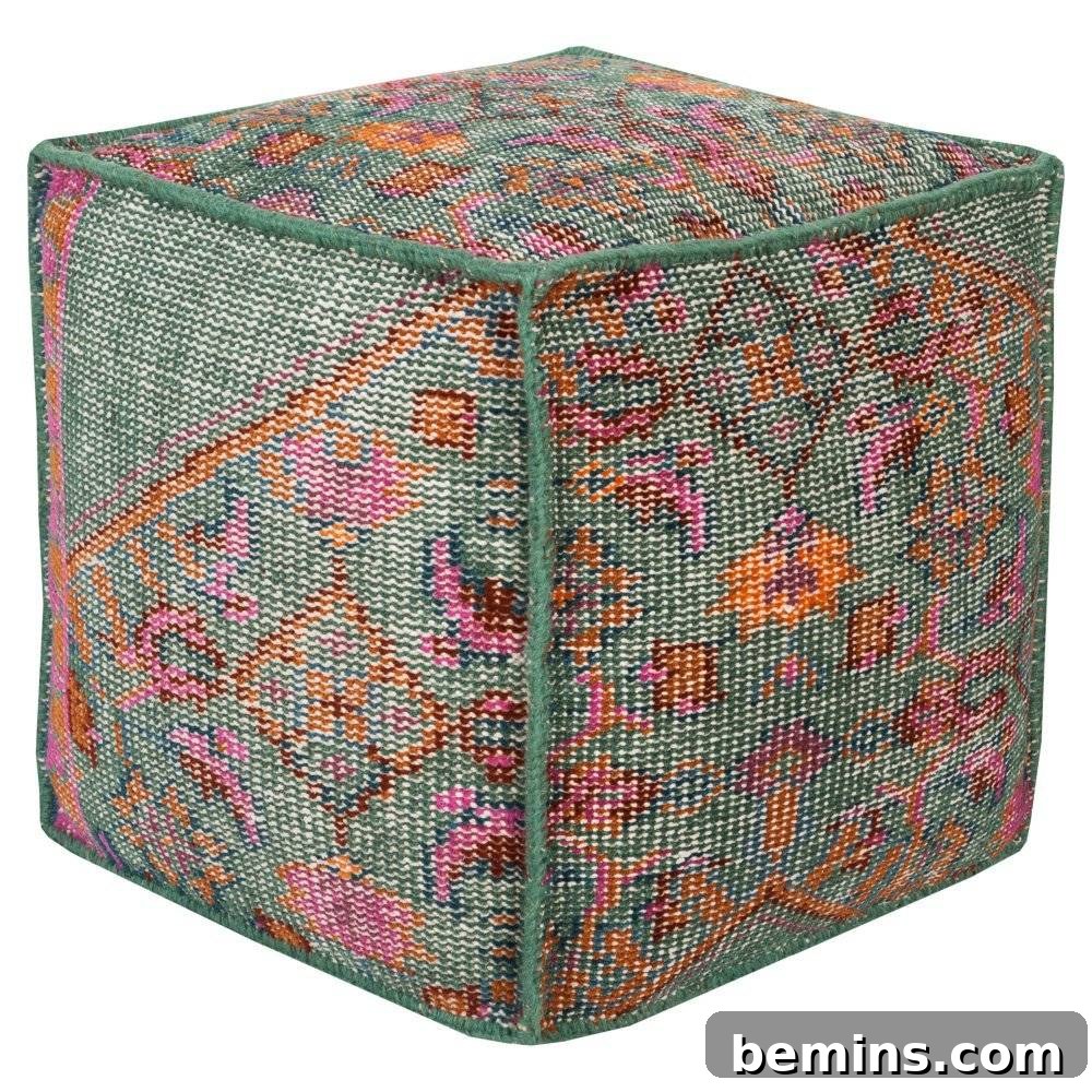 Hand-knotted wool pouf with a colorful pattern.