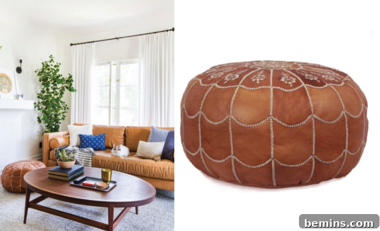 Cozy room featuring a brown couch and a pouf behind a wooden coffee table.