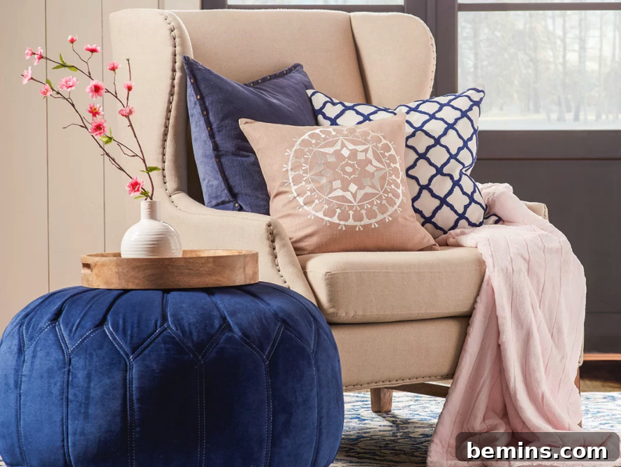 Blue velvet pouf adding a touch of comfort to a room.