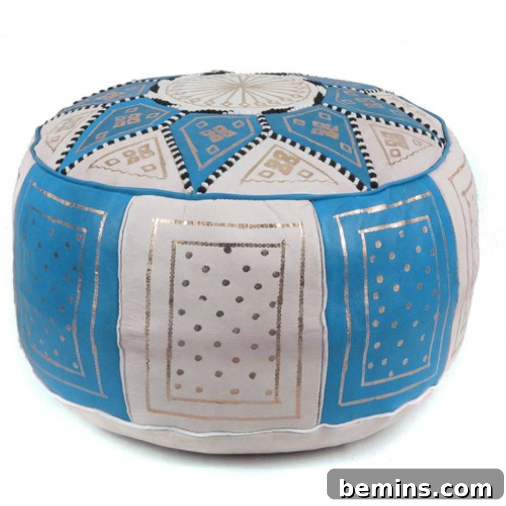 Moroccan-style blue pouf with gold accents.