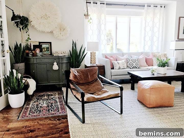 Nordic-meets-boho living room with a minimalist fireplace, textured rug, and natural wood accents from House of Six Interiors.