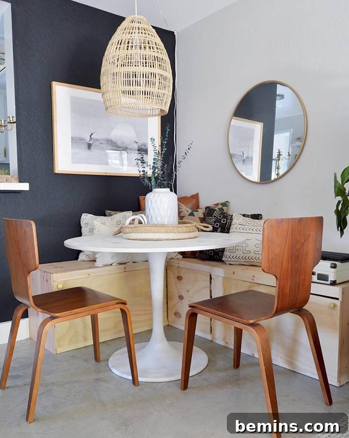 Stylishly curated boho interior with a woven wall hanging, natural wood furniture, and soft textiles by Bri Moysa.