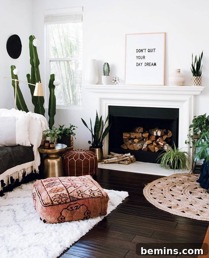 Bright and airy bohemian living space featuring light wood, woven accents, and a large plant, styled by Anita Yokota.