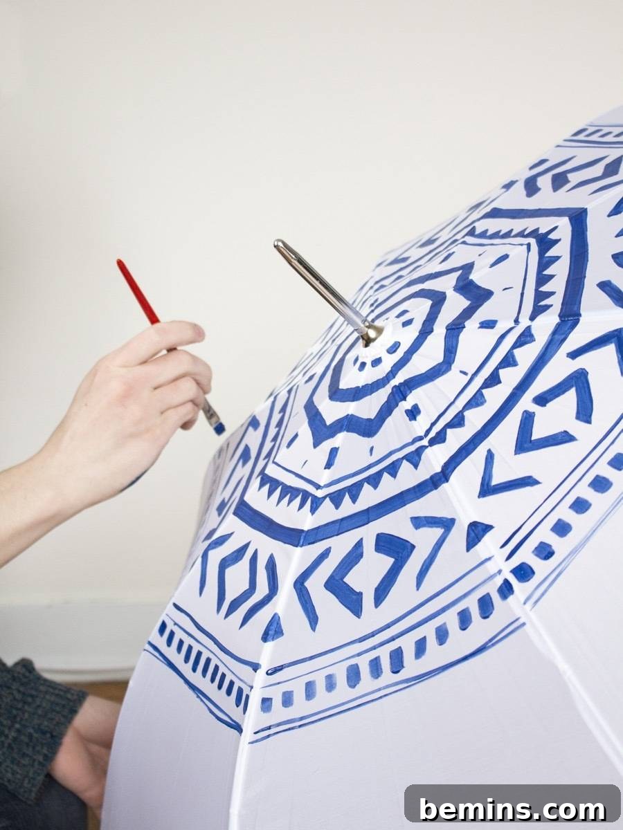 Painting an umbrella with fabric paint: adding details and patterns