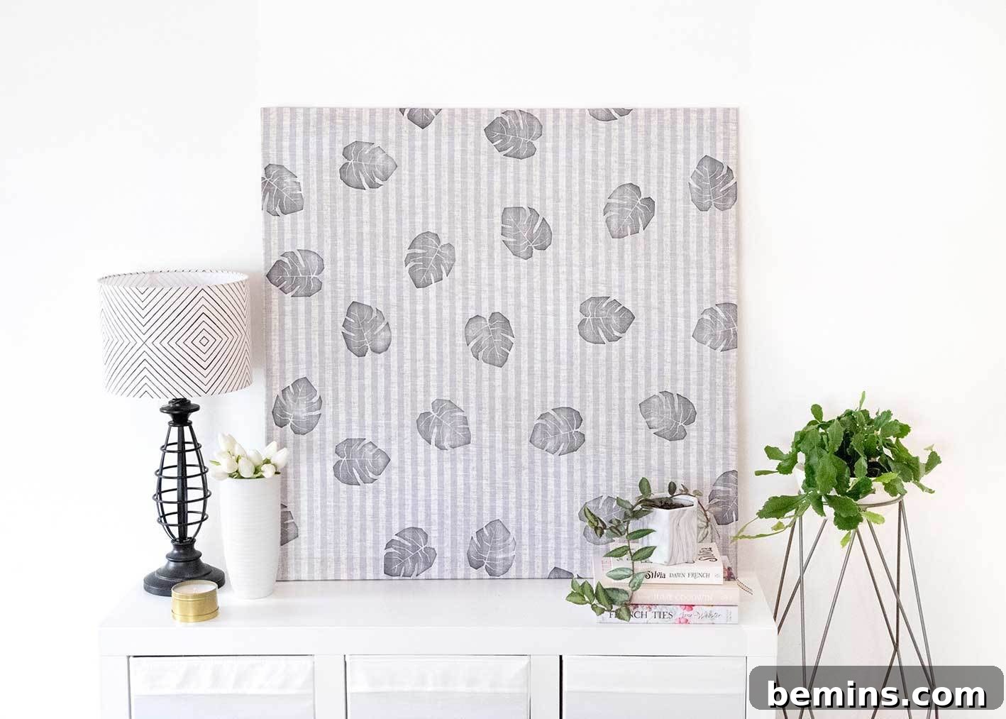 Creating affordable and stylish wall decor with fabric.