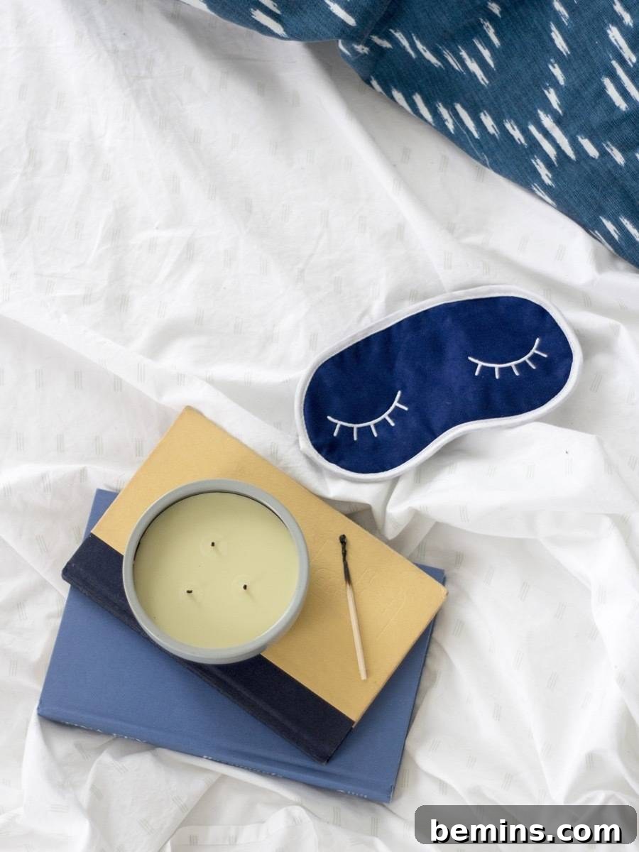 Close-up of a woman meditating in bed to help her fall asleep