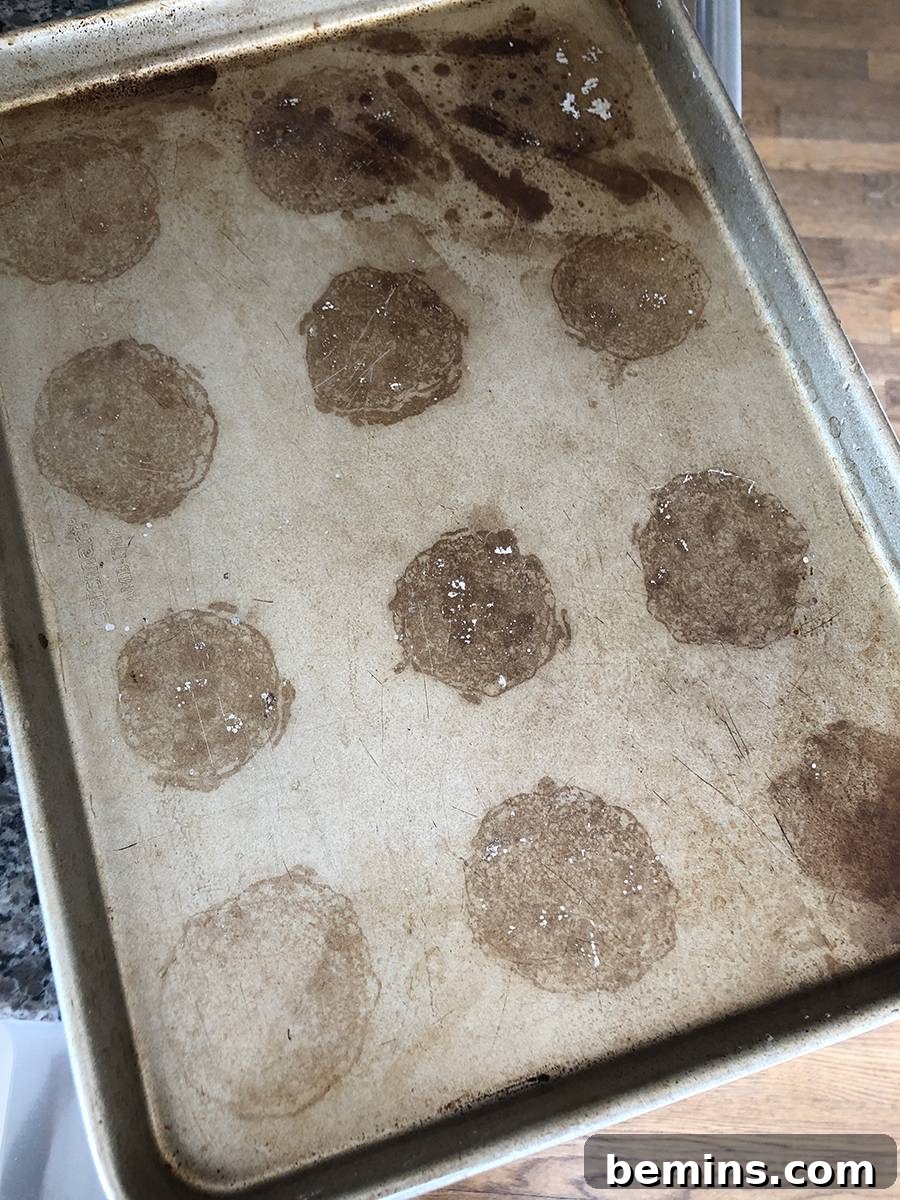 After: A still-dirty cookie sheet after the cleaning hack.