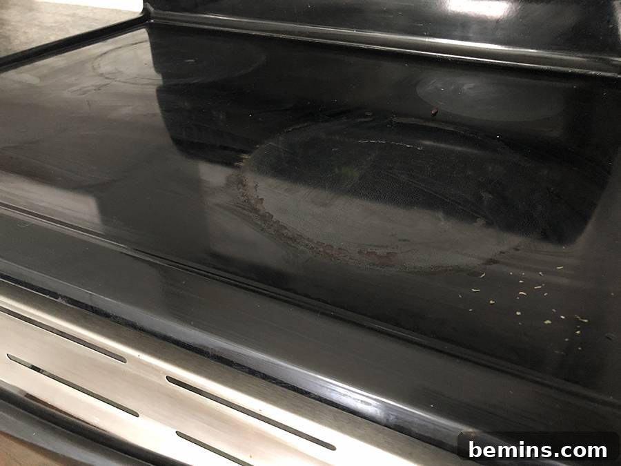 Before: A dirty cooktop.